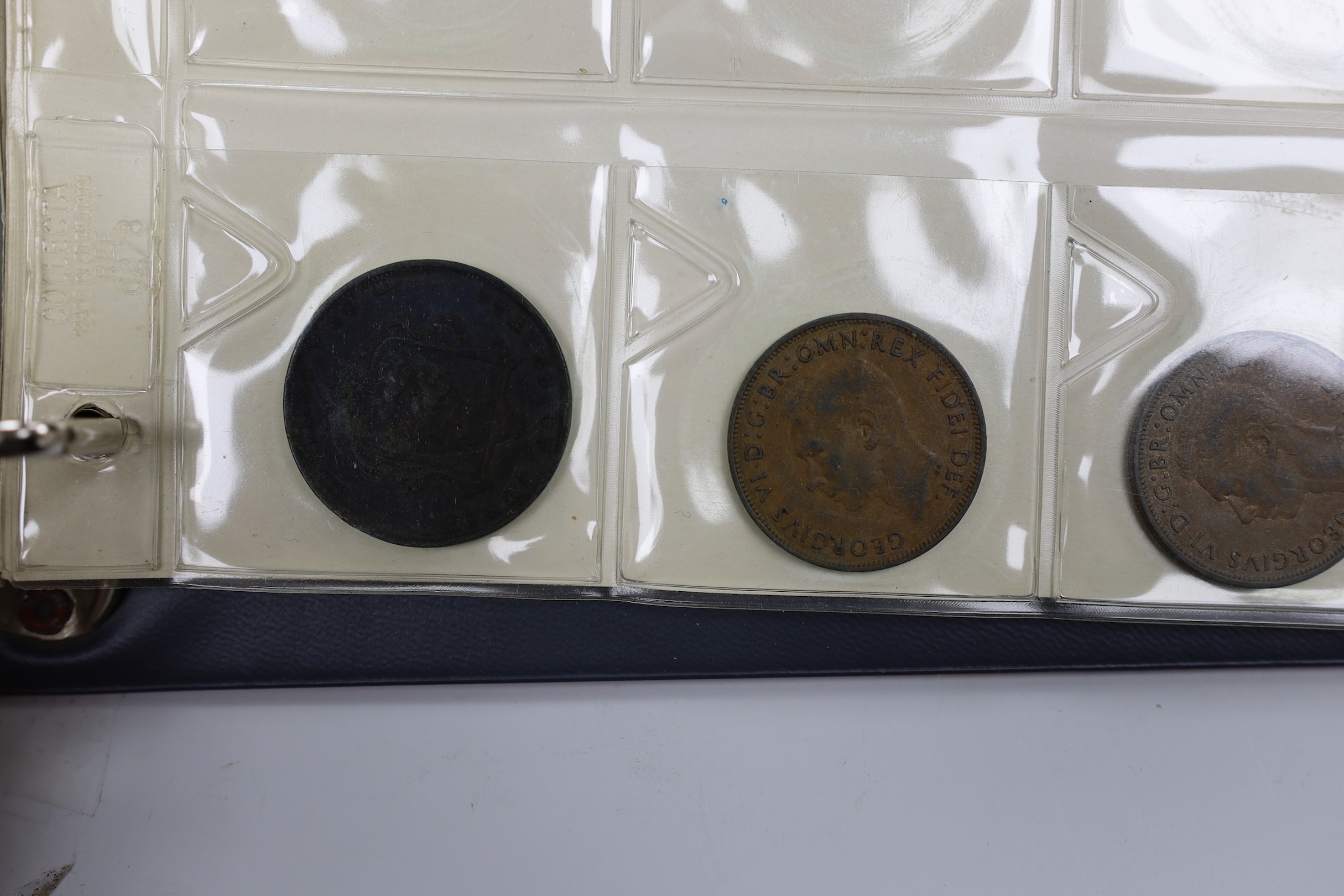 Two albums of UK coins, George III to George VI to include 1921 to 1946 halfcrowns, 1807 penny VF, 1805 Irish halfpenny AVF, a 'Revolution Jubilee 1788' medal etc